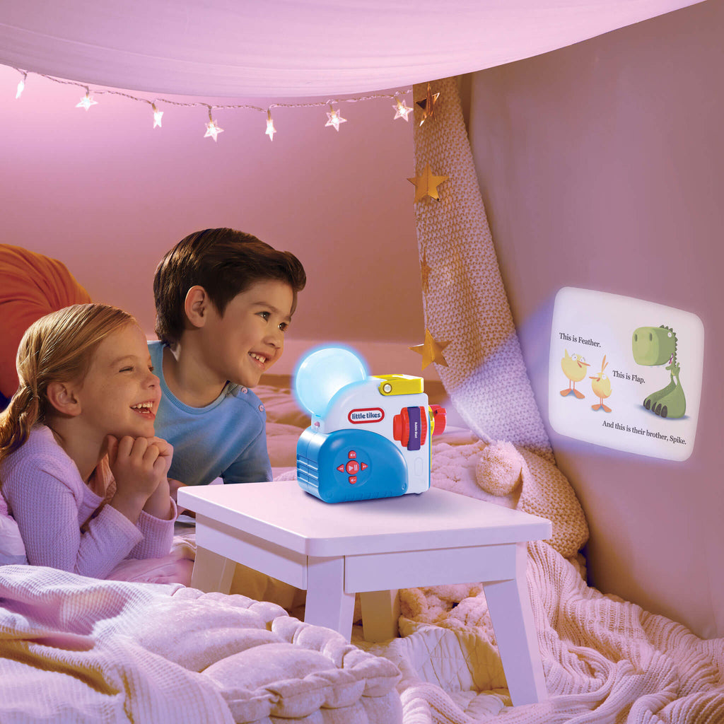 Kids watching Duck Duck Dinosaur on the wall